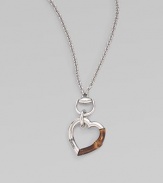 From the Bamboo Collection. A study in contrasts with this sterling silver and bamboo heart pendant on a rolo chain. Sterling silver Lenth, about 42 Pendant width, about 2 Lobster clasp closure Made in Italy 