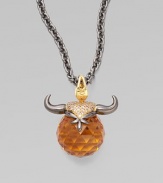 A goldplated and black rhodium plated sterling silver bull horns, complete with pavé cubic zirconia, looms over a topaz crystal, strung on a long elegant chain.Topaz crystal Cubic zirconia Goldplated sterling silver Black rhodium plated sterling silver Chain length, about 30 Pendant width, about 1½ Lobster clasp Imported