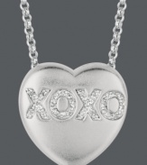 Say it from the heart. Sweethearts' adorable heart-shaped pendant expresses more that just great style with the letters XOXO written in round-cut diamonds (1/10 ct. t.w.) across the surface. Pendant crafted in sterling silver. Copyright © 2011 New England Confectionery Company. Approximate length: 16 inches + 2-inch extender. Approximate drop: 5/8 inch.