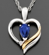 Stay true to your heart. This gorgeous pendant features round-cut sapphire (1/2 ct. t.w.) and diamond accents set in 14k gold and sterling silver. Approximate length: 18 inches. Approximate drop: 3/4 inch.