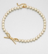 From the Skinny Mini Collection. A classic strand of lustrous faux pearls, sweetly accented with a sparkly bow.Faux pearlsRhinestonesGoldtoneLength, about 18Lobster claspImported