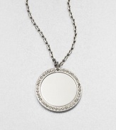 A simply chic circular pendant accented with sparkling rhinestones on a link chain. Glass stonesIon-plated brass and steelLength, about 16Pendant size, about .66 Lobster clasp closureImported 