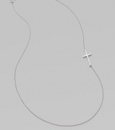 A wispy chain of 14k white gold features a cross pendant set askew for a modern edge.14k white gold Length, about 16 Pendant length, about ¾ Spring ring clasp Made in USA