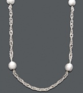 Simple style to be worn solo or paired with other chains for a chic, layered effect. Giani Bernini puts an elegant twist on the traditional Singapore chain with polished, bead details. Crafted in sterling silver. Approximate length: 16 inches.