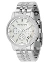 MICHAEL Michael Kors chronograph bracelet watch in stainless steel. Clear stone bezel. White dial with clear crystal accents. Date display and second hand. Water resistant to 100 meters.