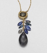 From the Elements Siyabona Collection. One bold faceted teardrop and a cluster of tiny faceted leaves hang from a deeply colored oval framed in Swarovski crystals, all on a graceful golden chain.CrystalLabradorite, blue kynite and pyriteGoldtoneLength, about 16 with 3 extenderLobster claspMade in USA