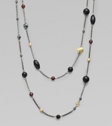 This delicately long design features garnet, hematite, black onyx and 18k gold station beads in various sizes and shapes. Garnet, hematite, black onyx and 18k gold beadsBlacked sterling silverLength, about 36Slip-on styleImported 