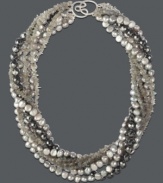 The epitome of elegance. Multiple strands of grey cultured freshwater pearls (5-5-1/2 mm) intertwined and twisted together with sparkling hematite and labradorite beads (194-3/8 ct. t.w.) create a classy look. Crafted with an intricate sterling silver clasp. Approximate length: 17 inches.