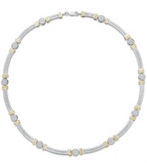 Try a trendy two-tone style. This intricate cable link necklace is crafted in 14k gold and sterling silver for a versatile touch, while sparkling diamond accents add shine. Approximate length: 16 inches.