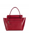 With a rich shade of brick red and clever handle slot, Jil Sanders smooth calf leather tote is an exquisitely chic choice - Double top handles with engraved logo luggage tag attached, zippered front slit pocket, inside cinch strap, green leather interior, zippered back wall slit pocket, front wall slit pocket and card slots - An immaculate way to add color into your outfit