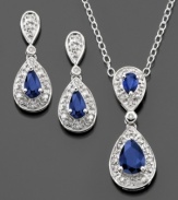 Bask in elegance. This beautiful teardrop matched pendant and earrings set features pear-cut sapphire (1-3/8 ct. t.w.) and round-cut diamond (1/10 ct. t.w.) set in sterling silver. Approximate length: 18 inches. Approximate pendant drop: 1 inch. Approximate earring drop: 3/4 inch. Item comes in a convenient red gift box, while supplies last.