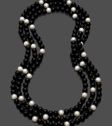 Black and white collide with classic contrast in this distinguished onyx and cultured freshwater pearl (8-9mm) necklace. Approximate length: 64 inches.