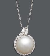 The perfect combination of polish and shine. This luxurious pendant highlights a cultured South Sea pearl (12-13 mm) surrounded by a halo of sparkling round-cut diamonds (1/2 ct. t.w.). Setting and chain crafted in 14k white gold. Approximate length: 18 inches. Approximate drop: 1 inch.