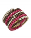 Glitz & glamour meet understated elegance. Add a two-dimensional accessory to your wardrobe with this INC International Concepts' coil bracelet. Featuring pink plastic rondells, glass rhinestone cupchain and wood beads, it's set in mixed metal with 12k gold plating. Bracelet stretches to fit wrist. Approximate diameter: 2-1/4 inches.