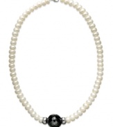 A single strand of polish and shine. This pretty necklace features cultured freshwater pearls (8-8-1/2 mm) and bold onyx beads (12 ct. t.w.). Set in sterling silver. Approximate length: 18 inches.