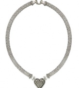 A romantic accent. This chic, heart charm necklace is outlined by sparkling round-cut diamonds (1/4 ct. t.w.) with a trendy mesh chain. Set in sterling silver. Approximate length: 18 inches. Approximate drop: 1 inch.