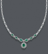 Take your evening wear from drab to dramatic with this lovely necklace by Effy Collection. A polished 14k white gold setting features oval-cut emeralds (17-7/8 ct. t.w.) surrounded by dazzling round-cut diamonds (2-1/3 ct. t.w.). Approximate length: 17 inches. Approximate drop: 1 inch.