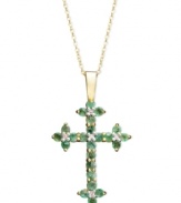 Boldly express your faith. This intricate cross pendant displays round-cut emeralds (1-1/6 ct. t.w.) and sparkling diamond accents set in 14k gold. Approximate length: 18 inches. Approximate drop: 1-1/4 inches.