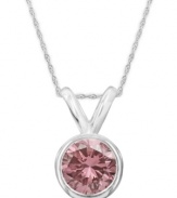 Perfection in pink. A round-cut, bezel-set pink diamond (1 ct. t.w.) shines in a luminous 14k white gold setting. Approximate length: 18 inches. Approximate drop: 1/2 inch.