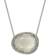 Inspired by nature, this stunning pendant highlights an organically-shaped moonstone (7-5/8 ct. t.w.) surrounded by round-cut diamonds (1/4 ct. t.w.). Set in sterling silver. Approximate length: 18 inches. Approximate drop: 1/2 inch.