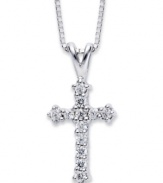 A sparkling representation of your faith. Crafted in 14k white gold, this stunning cross pendant is covered in round-cut diamonds (1/10 ct. t.w.). Approximate length: 18 inches. Approximate drop: 11/16 inch.