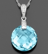 Pure pleasure. This pendant features round-cut blue topaz (7-1/3 ct. t.w.) and diamond accents set in 14k white gold. Approximate length: 18 inches. Approximate drop: 3/4 inch.