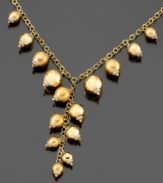 Glowing, gilded style. Spice up your daily look with this necklace crafted in brushed and polished 14k gold and sterling silver over sterling silver. Approximate length: 18 inches. Approximate drop: 3 inches.