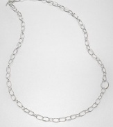 From the Scultura Collection. Links large and small create a look of elegant simplicity in this open chain necklace of polished sterling silver.Sterling silverLength, about 36Toggle closureImported