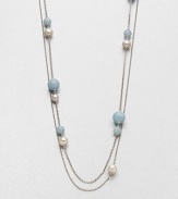 From the Sphere Collection. A long and graceful silver chain, to wrap as you choose, dotted with freshwater pearls and aquamarine beads.White cultured freshwater pearlsAquamarineSterling silverLength, about 45Special signature claspImported