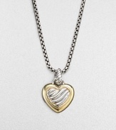 A cabled heart, gracefully framed in 18k gold with a cable bale, hangs from a bold signature chain. Sterling silver and 18k yellow gold Chain length adjusts from about 16 to 18 Pendant length, about ½ Lobster clasp Imported