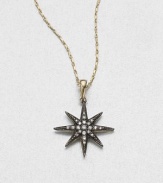 Twinkle, twinkle, diamond star, this starburst-shaped pendant of oxidized sterling silver hangs from a graceful 14k gold chain.Diamonds, .12 tcwSterling silver and 14k yellow goldChain length, about 16Pendant diameter, about ¾Spring ring claspMade in USA