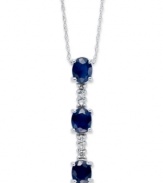 Elegance in the shape of a Y. This stunning pendant features three, oval-cut sapphires (1-3/8 ct. t.w.) with rows of diamond accents in between. Set in 14k white gold. Approximate length 16 inches. Approximate drop: 1 inch.