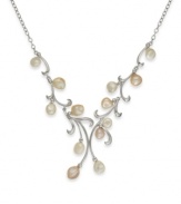 An ethereal delight. This whimsical necklace features a pretty leaf pattern highlighted by Keishi cultured freshwater pearls (8-10 mm). Set in sterling silver. Approximate length: 19 inches. Approximate drop: 2 inches.