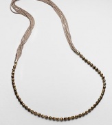 An artistic and modern design with faceted beads on a multi-row mesh chain. Glass beadsGalvanized mesh wireLength, about 39Slip-on styleImported 