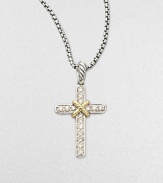 A cross of luminous pavé diamonds, accented with 18k yellow gold, hangs from a sterling silver chain.Diamond, 0.25 tcw 18k yellow gold Sterling silver Pendant length, about ¾ Chain length, about 16-17 Lobster clasp Imported