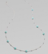 Mini ball accented sterling silver link chain with rich, faceted turquoise stone stations. TurquoiseSterling silverLength, about 38Lobster clasp closureImported 