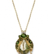 Beetle Beautification! This glamorous winged bug is adorned with green amethyst (9-3/4 ct. t.w.) and green tourmaline (2 ct. t.w.) gemstones, while diamond accents provide extra shine. Set in sterling silver and 14k gold. Approximate length: 18 inches. Approximate drop: 1 inch.