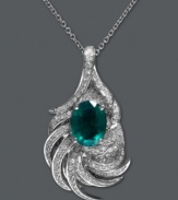 Get swept up in the glamour. Effy Collection's stunning leaf pendant features an oval-cut emerald (1-1/2 ct. t.w.) surrounded by sweeps of round-cut diamond (1/2 ct. t.w.). Setting and chain crafted in 14k white gold. From Brasilica by Effy. Approximate length: 18 inches. Approximate drop length: 1-1/4 inches. Approximate drop width: 2/3 inch.