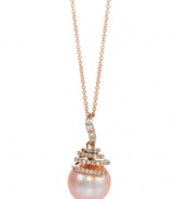 The sweetest touch. A pink cultured freshwater pearl (10-11 mm) decorated by round-cut diamonds (1/4 ct. t.w.) creates a feminine statement in Le Vian's pendant necklace. Crafted in 14k rose gold. Approximate length: 18 inches. Approximate drop: 3/4 inch.