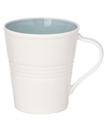 This charming porcelain mug features a seven-ringed motif. Mix and match with other Tin Can Alley Blue pieces for a subtly varied table setting. Qualifies for Rebate