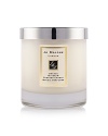 The scent of clementine leaves in the morning dew sparkles above a heart of orange blossom and water lily, transporting the wearer to a garden oasis. The Orange Blossom Home Candle infuses any room with evocative scent and lasts for hours. An everyday luxury, it brings warmth to any environment. 200g.