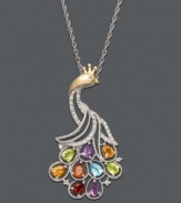 Capture all the colors of the rainbow with this majestic peacock pendant. A swirling 14k gold and sterling silver setting highlights sparkling round-cut diamonds (1/8 ct. t.w.) and cascading pear-cut gemstones, including blue topaz (1/5 ct. t.w.), citrine (1/4 ct. t.w.), madeira citrine (1/8 ct. t.w.), garnet (1/5 ct. t.w.), amethyst (1/4 ct. t.w.) and peridot (1/3 ct. t.w.). Approximate length: 18 inches. Approximate drop: 1-1/2 inches.