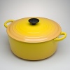 Le Creuset 2.75-qt. round French oven. This enameled cast iron casserole goes easily from oven or stovetop to the table. Ideal for cooking and re-heating risotto, soups, stew, and for simmering or slow-cooking foods. Secure lid seals in moisture and flavor. Retains heat well and is beautiful enough for tabletop serving. Features sturdy, cast handles and is oven-safe to 450 degrees.