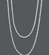 A modern take on a traditional pearl necklace. Belle de Mer takes cues from the latest layering trend by producing an ultra-long, ultra-shimmery pearl strand. Crafted from cultured freshwater pearls (7-8 mm). Approximate length: 54 inches.