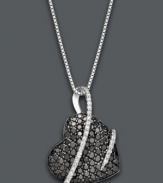 Sentimental sparkle. Sweetly contrasting round-cut white and black diamonds (1 ct. t.w.) make a perfectly stunning statement on this heart-shaped pendant. Set in sterling silver. Approximate length: 18 inches. Approximate drop: 1-1/8 inches.