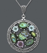 Ocean inspiration. Genevieve & Grace's circular pendant resembles a pretty pool full of round-cut blue topaz (1-1/4 ct. t.w.), amethyst (2/3 ct. t.w.) and abalone encircled with marcasite. Set in sterling silver. Approximate length: 18 inches. Approximate drop: 1-5/8 inches.