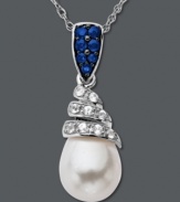 Swirling sophistication. Set in sterling silver, this unique pendant features round-cut blue sapphires at the bail (1/5 ct. t.w.) with round-cut white sapphires (1/5 ct. t.w.) encircling a cultured freshwater pearl (9 mm x 11 mm). Approximate length: 18 inches. Approximate drop: 1 inch.