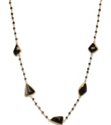 Geometrically chic! Fun chunks of onyx and petite onyx beads (52 ct. t.w.) adorn this unique station necklace. Crafted in 18k gold over sterling silver. Approximate length: 17 inches.