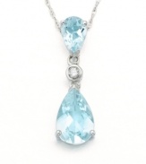 Dazzling pear-cut aquamarines (1-1/2 ct. t.w.) and the icy luster of 14k white gold combine for a luxurious look. Features a sparkling diamond accent at center. Chain measures 18 inches.