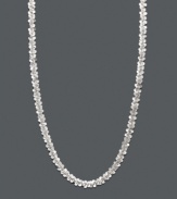 The perfect accessory to complement any ensemble. This 14k white gold necklace features an intricate faceted design. Approximate length: 18 inches.